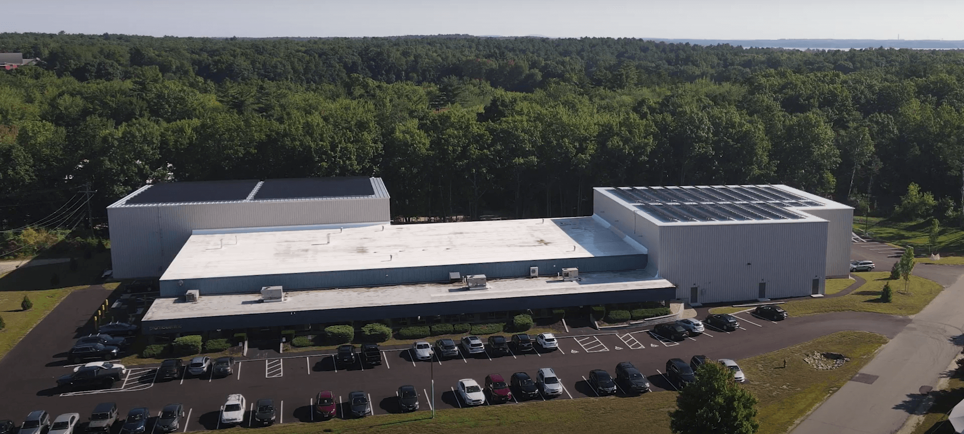 Aerial view of the PromoCentric building and parking lot