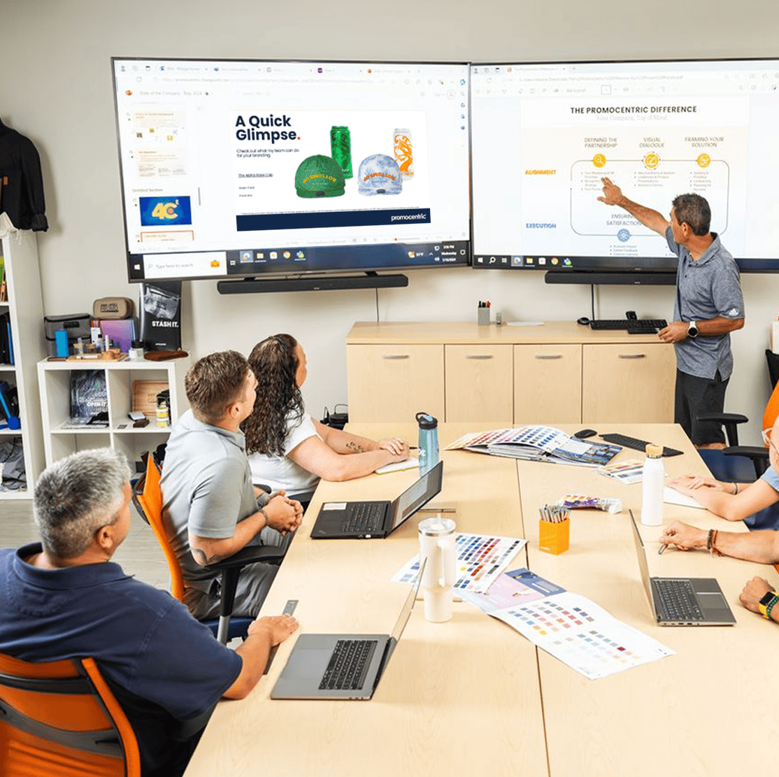 A group of people in a conference room.