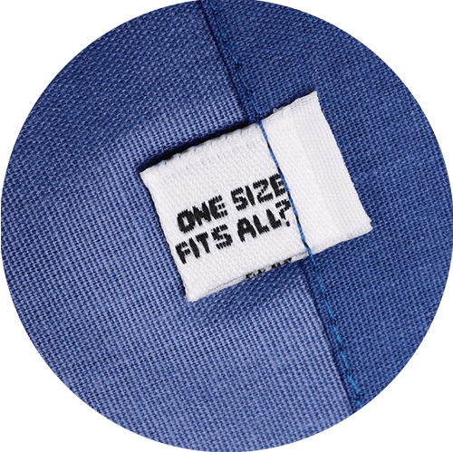 Photo of a clothing tag on a piece of fabric.